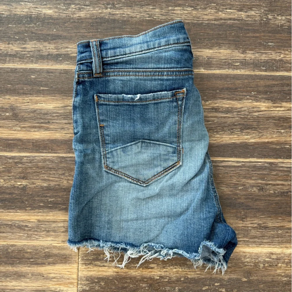 Women’s Distressed Blue Denim Shorts